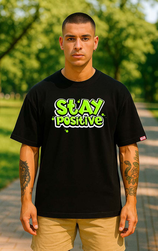 Bekaar Oversized Black T-Shirt – “Stay Positive” Graffiti Text Design | Green Bubble Typography Streetwear | 240 GSM Heavyweight Cotton | Unisex Drop Shoulder Fit