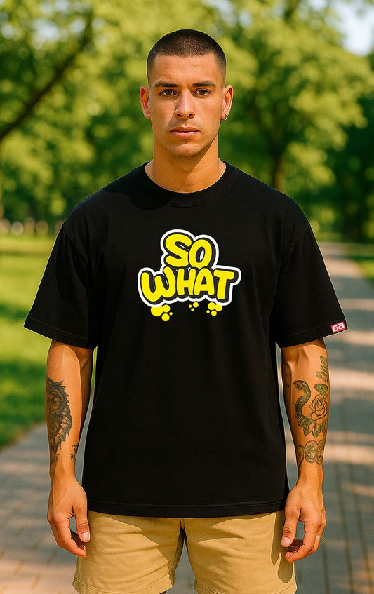 Bekaar Oversized Black T-Shirt – “SO WHAT” Cartoon Bubble Text Graphic | Bold Yellow Typography | 240 GSM Cotton | Streetwear Drop Shoulder Tee for Men & Women