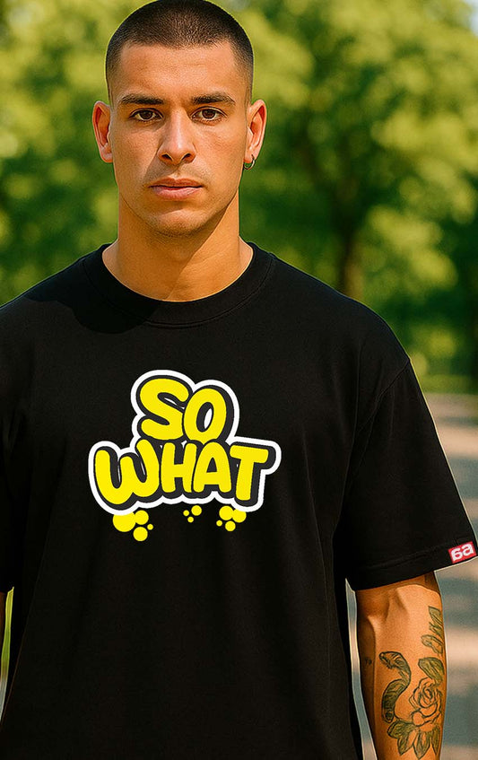 Bekaar Oversized Black T-Shirt – “SO WHAT” Cartoon Bubble Text Graphic | Bold Yellow Typography | 240 GSM Cotton | Streetwear Drop Shoulder Tee for Men & Women