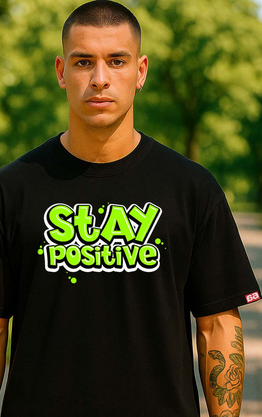 Bekaar Oversized Black T-Shirt – “Stay Positive” Graffiti Text Design | Green Bubble Typography Streetwear | 240 GSM Heavyweight Cotton | Unisex Drop Shoulder Fit